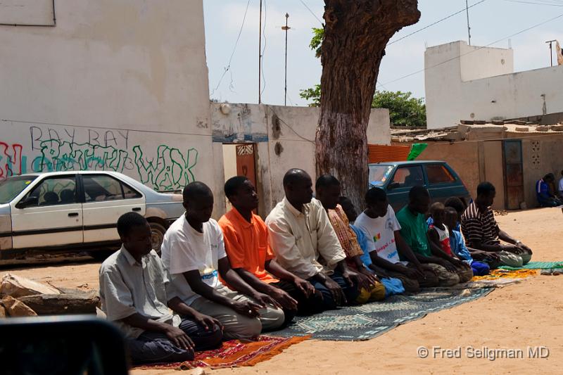 20090529_141408 D3 P1 P1.jpg - Prayer on the street.  The prayer service is announced on loud speakers from the nearest mosque